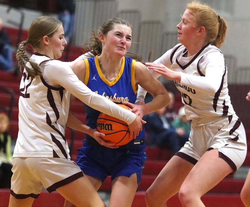 Johnsburg’s Summer Toussaint navigates heavy traffic in varsity girls basketball on Tuesday, Jan. 6, 2026 at Homer “Bill” Barry Gymnasium on the campus of Marengo High School in Marengo.
