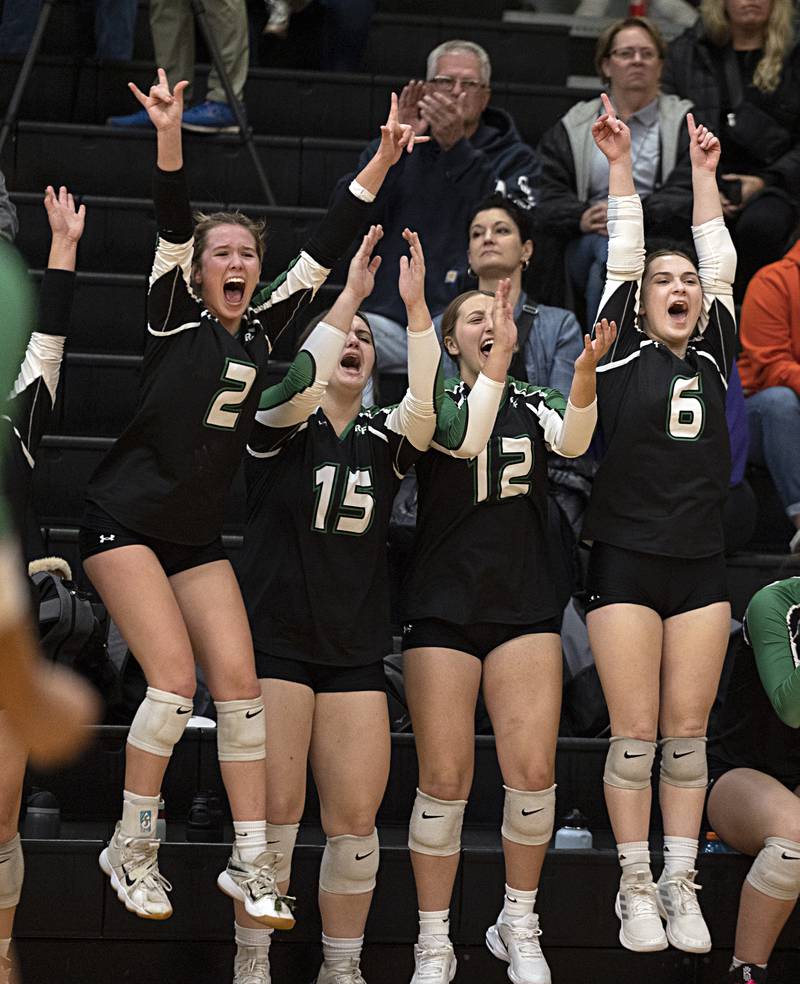 The Rock Falls bench celebrate a point against Chicago Christian Friday, Nov. 3, 2023 in the class 2A volleyball supersectional in Sandwich.