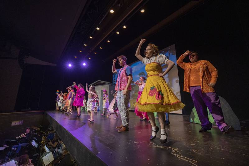 Cast members for Newman High School’s rendition of “The Wizard of Oz” rehearse a scene Wednesday, April 9, 2025.