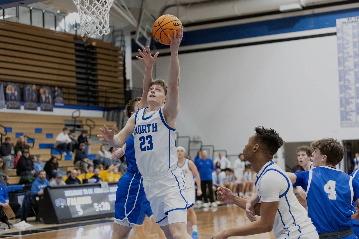 St. Charles North's Cooper Mellican goes in for the layup against Wheaton North on Thursday, Jan. 29,2026 in St. Charles.