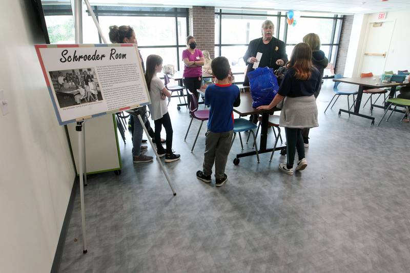 Mark Doetsch, of Island Lake, magician, entertains patrons with his magic tricks Saturday, May 13, 2023, in the Schroeder Room, during the Antioch Public Library District Open House in Antioch.The Schroeder Room was included in renovations to the library and was made larger.