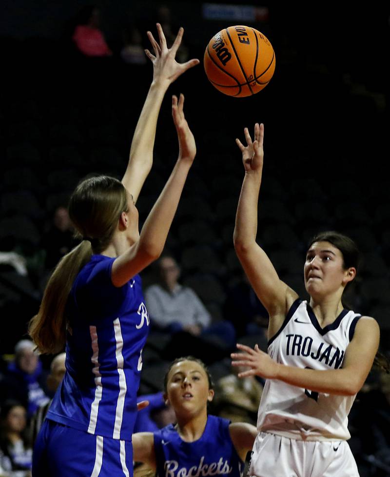 Cary-Grove's Kennedy Manning shoots the ball over Burlington Central's Ainsley Wilson during a Fox Valley Conference basketball game  on Tuesday, Jan. 14, 2025, at Now Arena in Hoffman Estates.