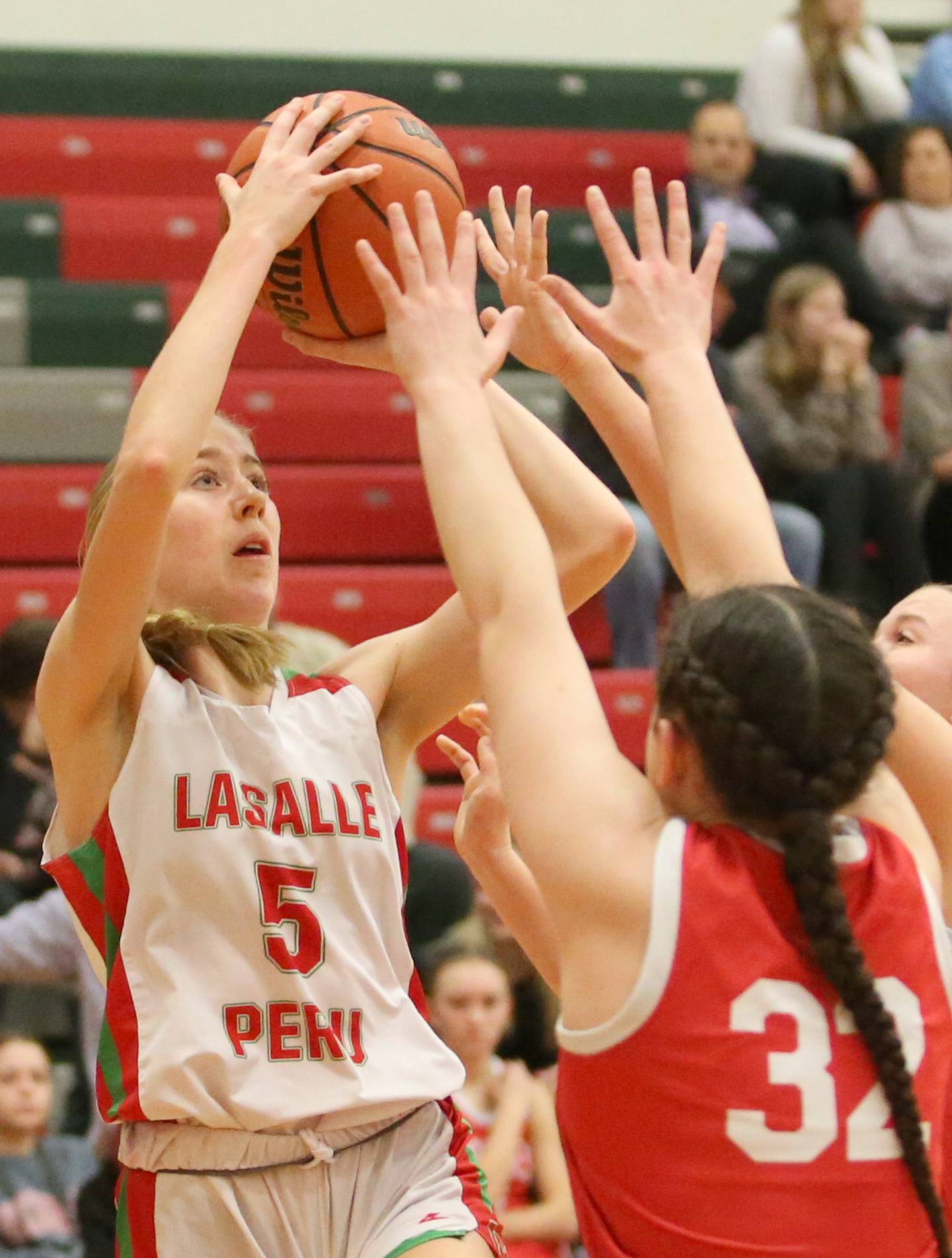L-P's Addison Urbanski eyes the hoop while being guarded by Ottawa's Mary Stisser on Wednesday, Jan. 10, 2024 at Sellett Gymnasium.