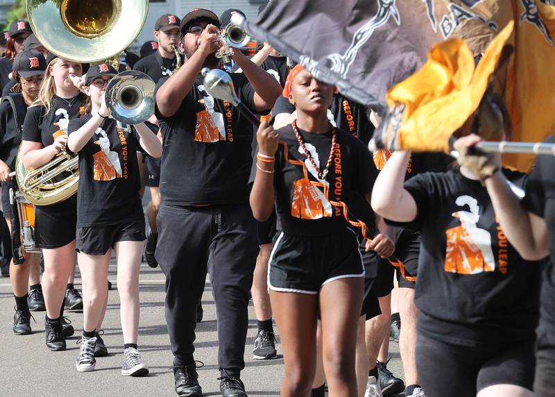 The DeKalb High School marching band plays Monday, May 29, 2023, in the DeKalb Memorial Day parade.