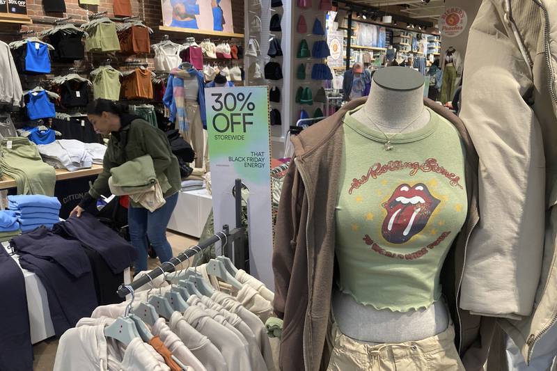 FILE - A Rolling Stones t-shirt from 1970 is displayed in the Westfield Garden State Plaza shopping mall in Paramus, New Jersey, on Saturday, December 17, 2022. On Thursday, the Labor Department reports on U.S. consumer prices for December. (AP Photo/Ted Shaffrey, File)