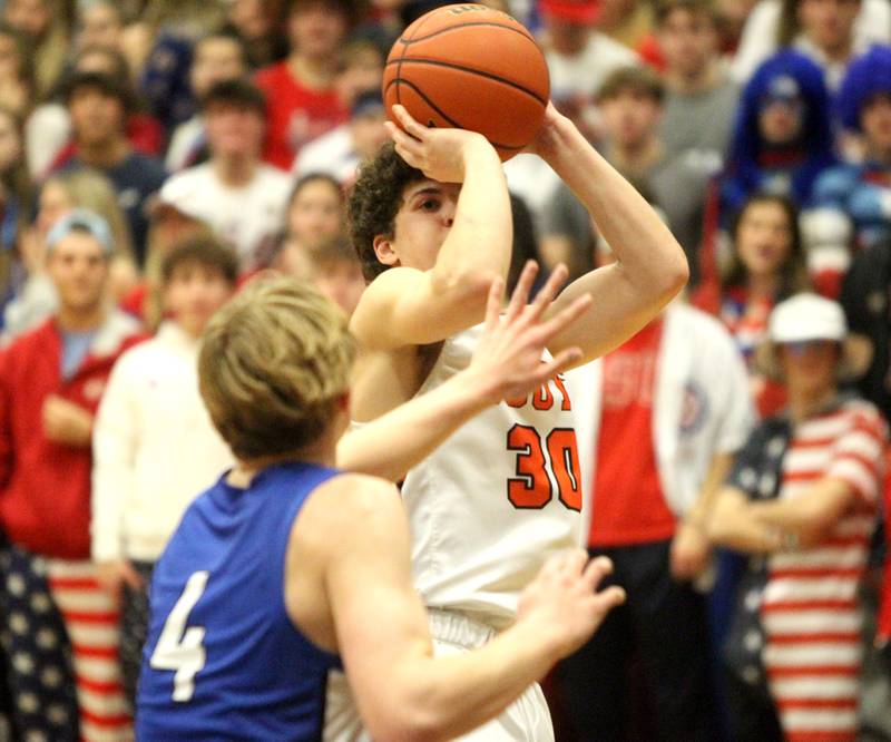 Wheaton Warrenville South’s Luca Carbonaro shoots the ball during a game against Geneva in Wheaton on Friday, Jan. 27, 2023.
