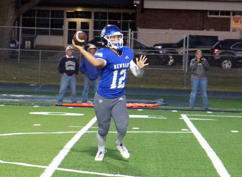 Newman quarterback Evan Bushman makes a pass Saturday, Sept. 7, 2024, against Mendota.