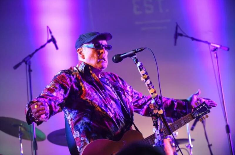 Rick Nielsen, of Cheap Trick, performs with his family band The Nielsen Trust on Saturday night on The Majestic Theater stage during the second annual Wintersong music festival in downtown Kankakee.