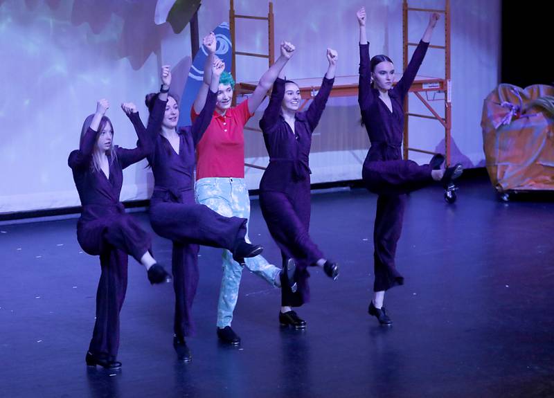 Hannah Covalt (center), playing Squidward, and the featured dancers work on a dance number before the start of a dress rehearsal for the McHenry Community High School’s production of “The SpongeBob Musical” on Tuesday, March 7, 2023, at the school’s Upper Campus.