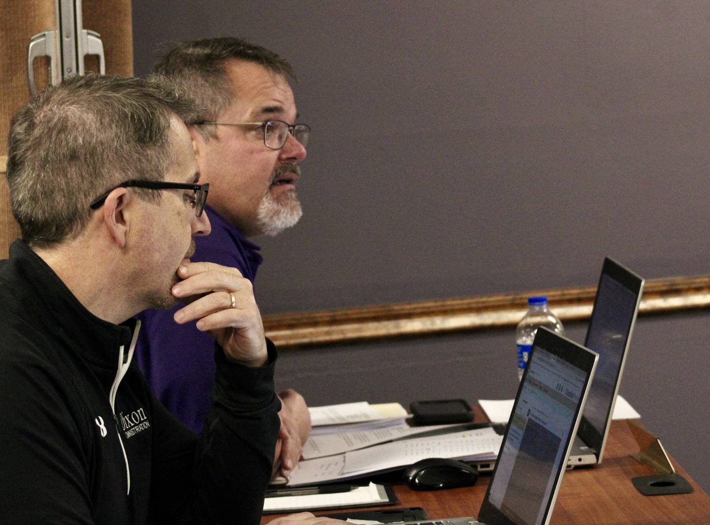 Doug Stansford, assistant superintendent, sits beside Marc Campbell, business manager, on Wednesday, Nov. 16, 2022, during a regular meeting of the board of education for Dixon Public Schools. Stansford briefed the board on curriculum development and Campbell on the legal requirement to conduct a truth in taxation hearing in December.