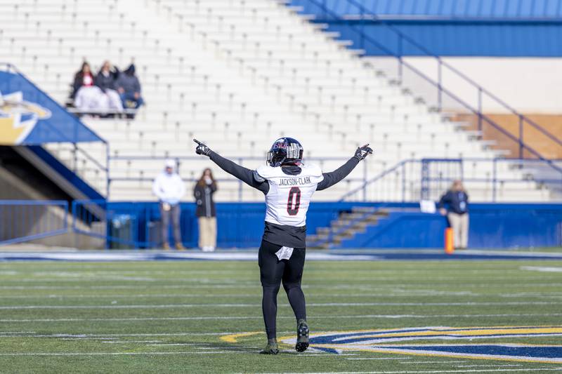 Linebacker Tyler Jackson celebrates NIU's win at Kent State on Saturday, November 25, 2023.