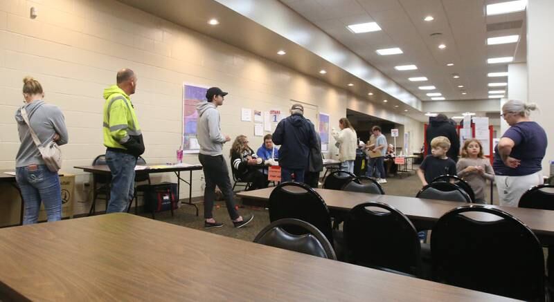 A line of voters wait to collect their ballots from election judges on Tuesday, Nov. 5, 2024 at the Knights of Columbus Hall in Ottawa.