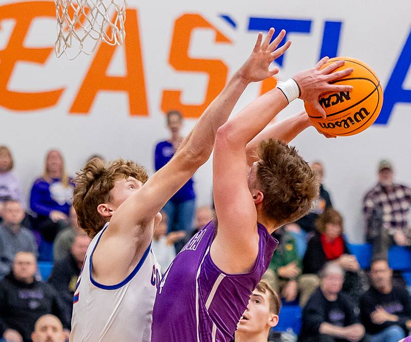 Pecatonica's Brody Black puts up a shot against Eastland's Braden Anderson during the second half of their matchup on Thursday, Dec. 19, 2024.
