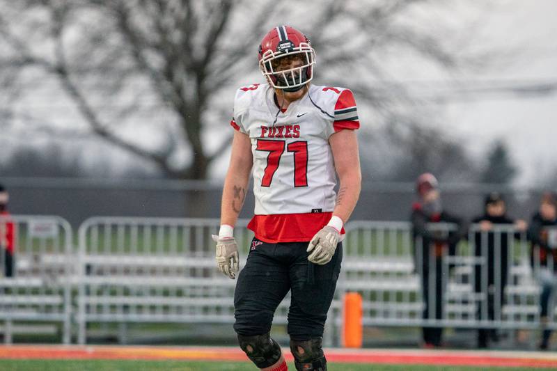 Yorkville's Logan Brasfield (71) walks off the field after a season ending loss to Batavia in a 7A quarterfinal playoff football game at Batavia High School on Saturday, Nov 12, 2022.