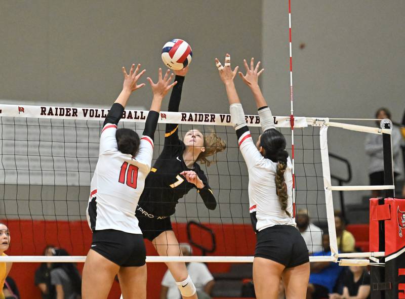 Joliet West's Gabby Piazza (7) attacks during a nonconference game against Bolingbrook on Wednesday, Aug. 23, 2022.