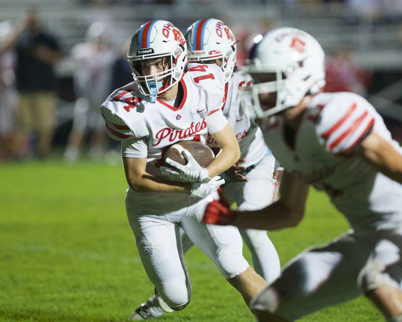 Ottawa's Archer Cechowicz looks for room to run against Kaneland  on Friday, Sept. 22, 2023 in Maple Park.