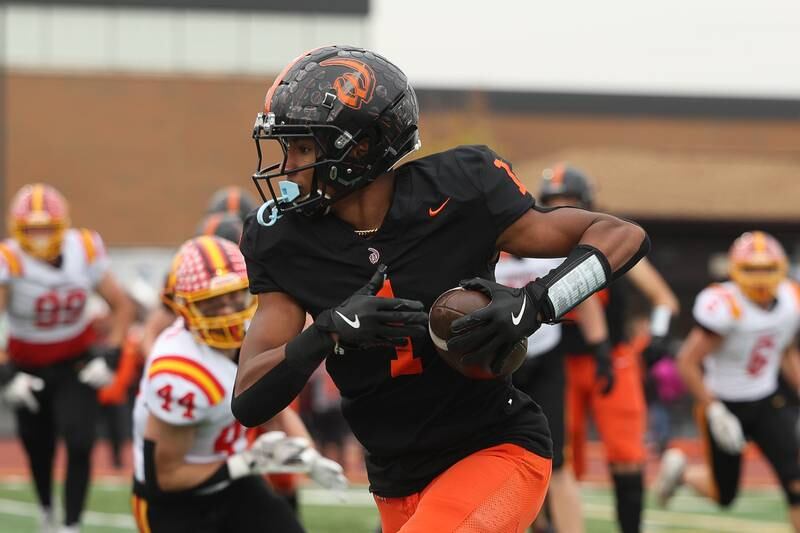 Lincoln-Way West’s DeAndre Coates breaks upfield after a catch against Batavia on Saturday, Nov. 9, 2024 in New Lenox.