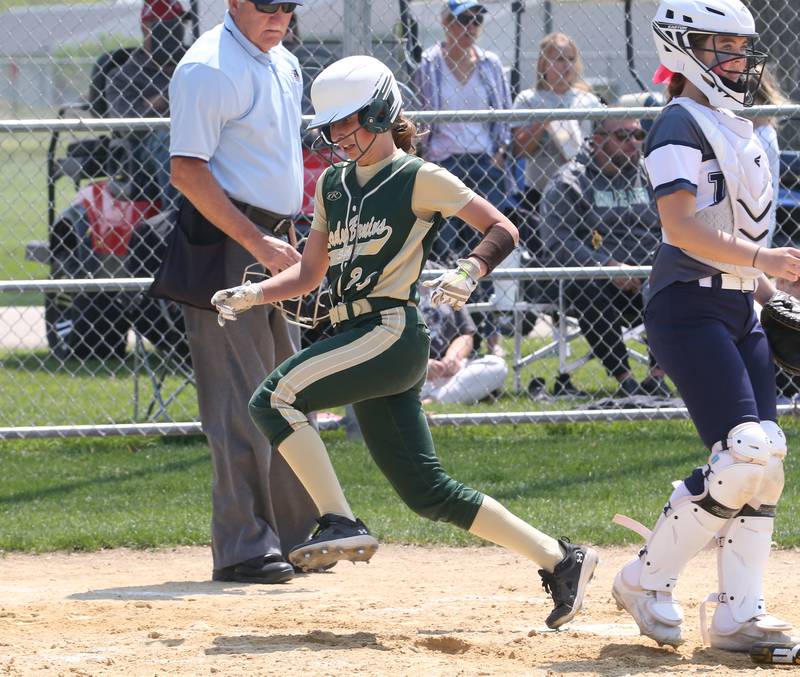 St. Bede's Emma Slingsby scores a run against Annawan/Wethersfield in the Class 1A Regional final game on Saturday, May 20, 2023 in Annawan.