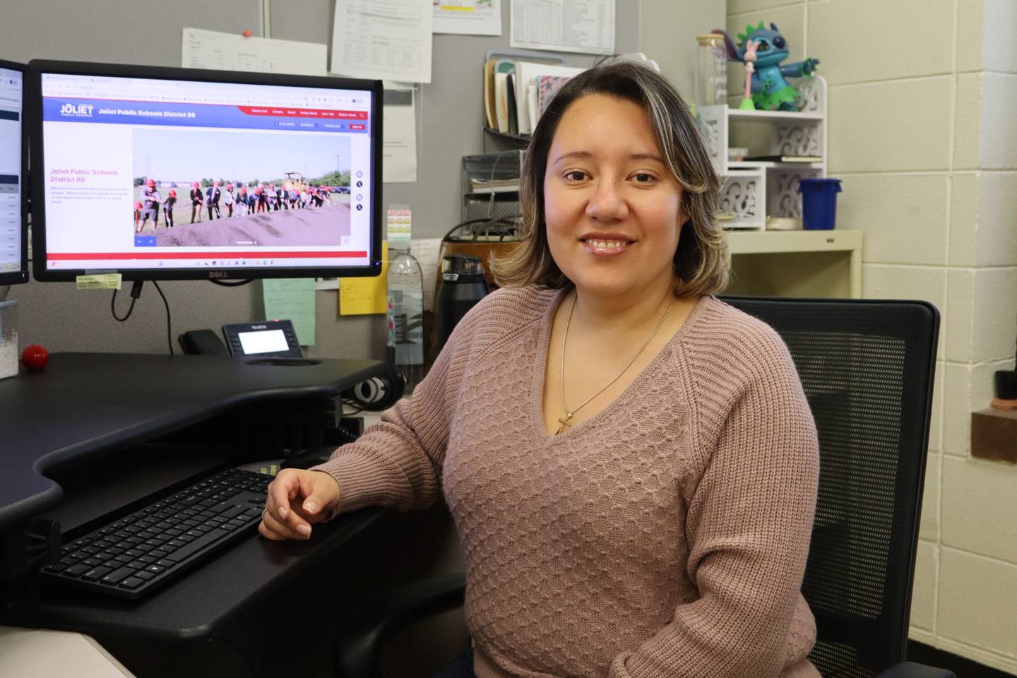 Elvia Mendoza, a Navy veteran, is an assistant data specialist at J.F. Kennedy Administrative Center at Joliet Public Schools District 86.