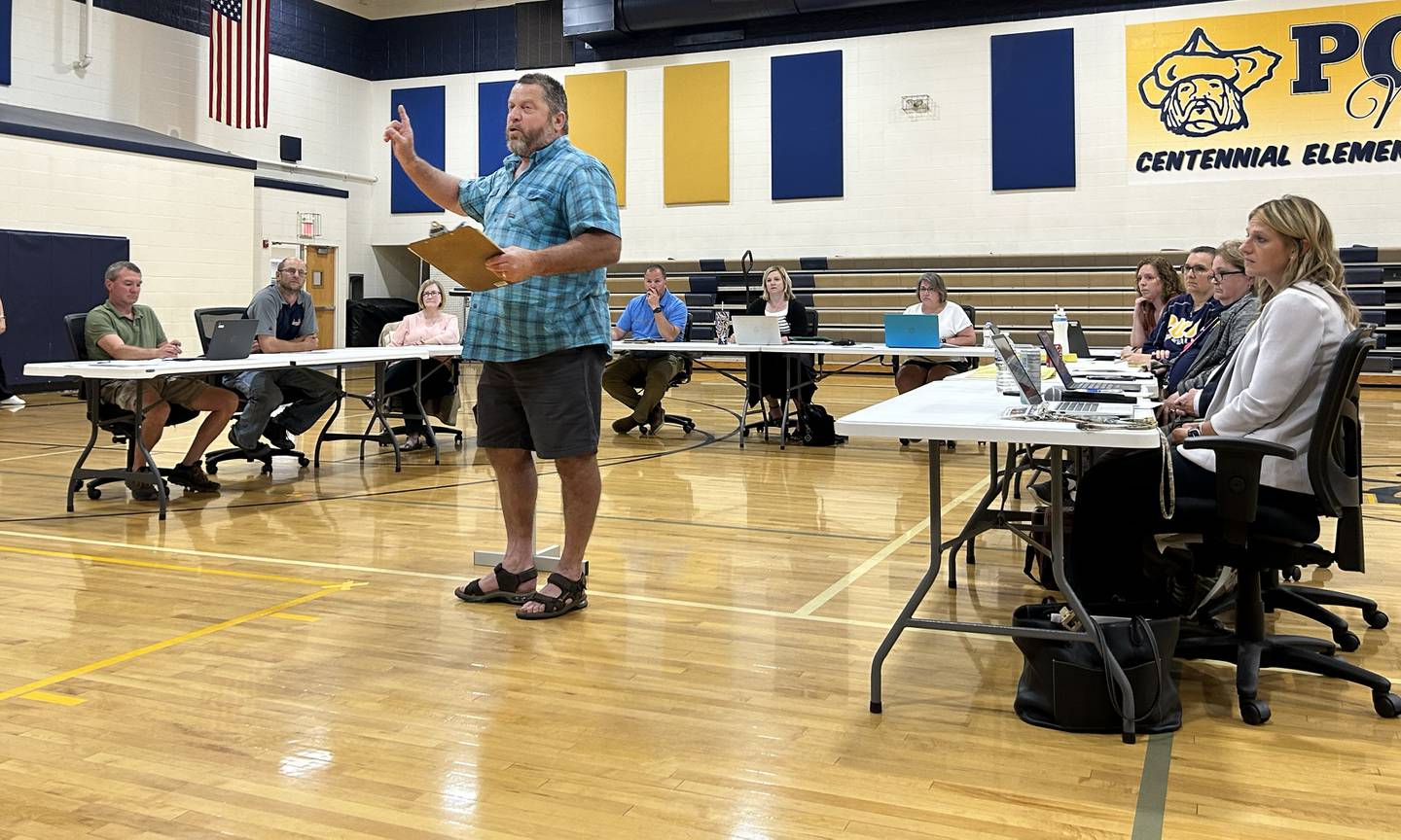 Mike Bowman speaks to the crowd during the Polo School Board's public comment period on Wednesday, June 18, 2025 at the Centennial Grade School.