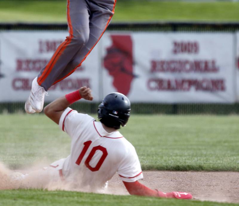 Huntley's Diego Herrera steals second base during a Fox Valley Conference baseball game on Tuesday, May 8, 2026, at Huntley High School.