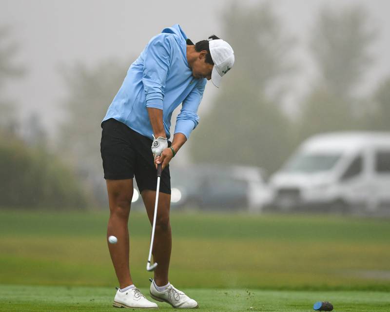 Glenbard West's golfer Ivan Blood tees off on the first hole of the West Suburban golf match on Tuesday Sept. 24, 2024, held at Prairie Bluff Golf Course in Crest Hill.