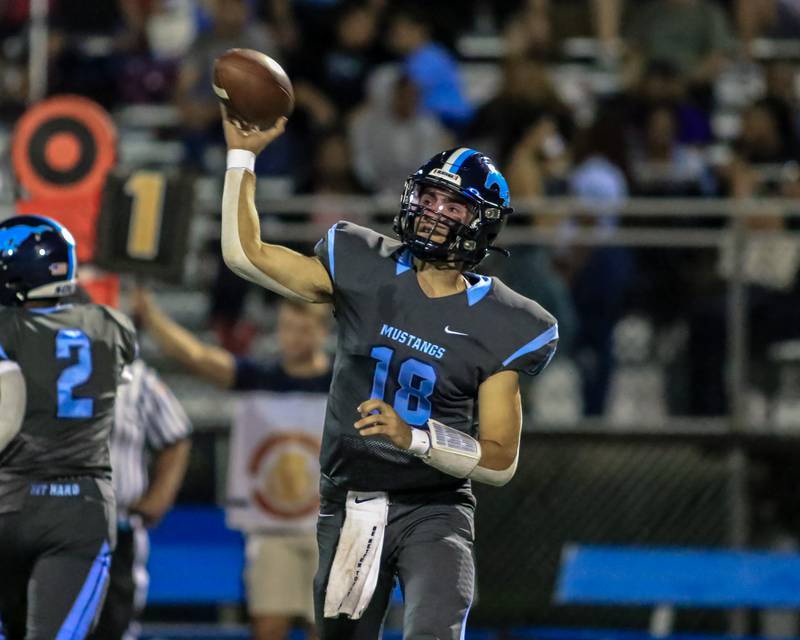 Downers Grove South's Ryan Dawson (18) passes during varsity football game between Willowbrook at Downers Grove South.  Sept 16, 2022