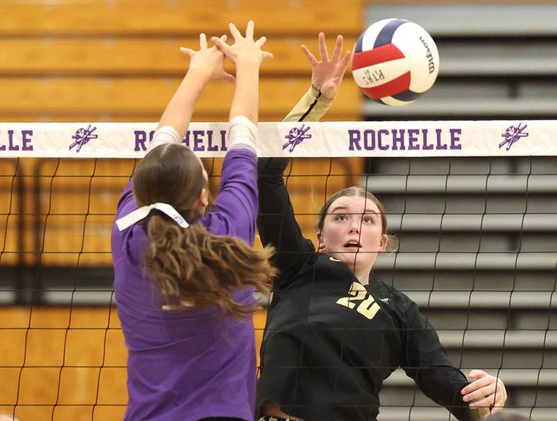 Sycamore's Ava Wente-Argo tries to get the ball by Rochelle's Audyn Kemp Tuesday, Oct. 28, 2025, during their Class 3A regional semifinal match at Rochelle High School.