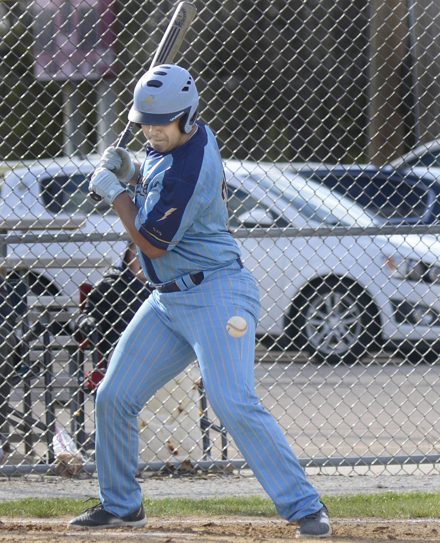 Marquette’s Sam Mitre is hit by a pitch Tuesday against Roanoke-Benson/Lowpoint-Washburn at Masinelli Field.