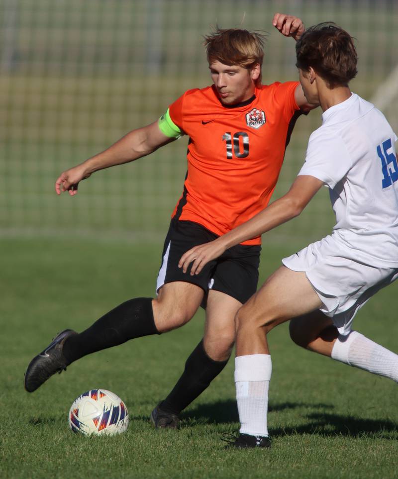 Crystal Lake Central’s Gideon Burleson moves the ball against Burlington Central in varsity soccer on Thursday Sept. 26, 2024, at Crystal Lake Central High School in Crystal Lake.