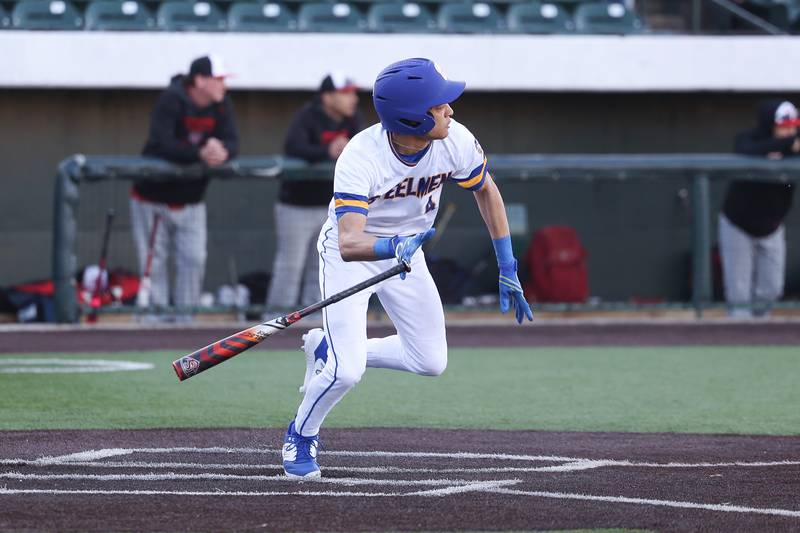 Joliet Central’s Andrew Nixon drives in two runs against Aurora East on Monday, Mar. 11th in Joliet.