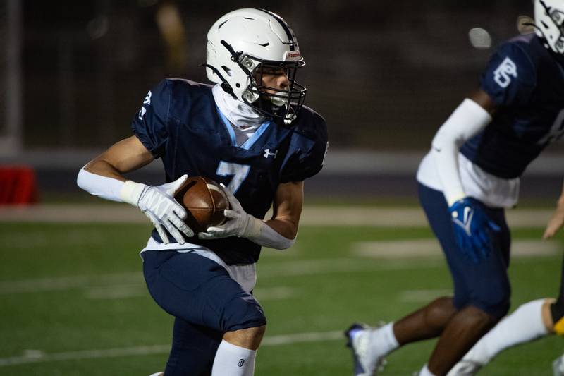 Plainfield Souths Orlando Cruz runs the ball during a game against Joliet West Friday Oct. 4, 2024 at Plainfield South High School