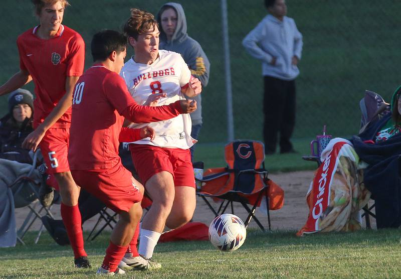 Streator's Blake Fialko kicks the ball away from L-P's Ismael Mejia during the Class 2A Regional semifinal game on Monday, Oct. 20, 2025 at Ottawa High School.