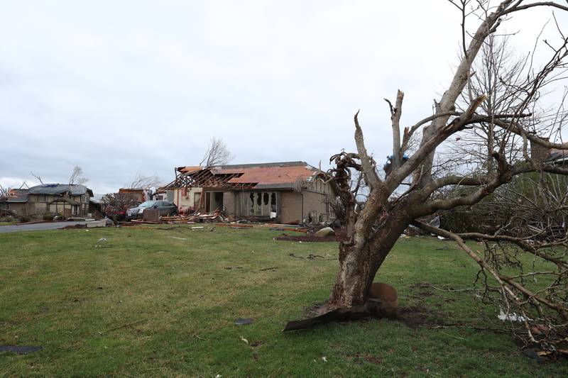 Damage to homes is seen along Shaftsbury Road in Aroma Park on March 11, 2026 following a March 10 tornado that passed through Kankakee County.