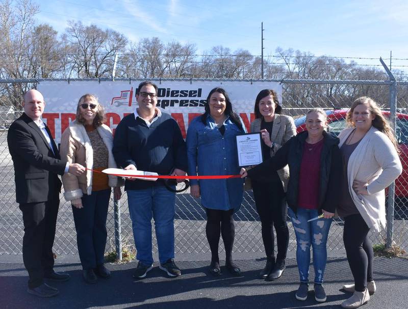 (From left to right) Ben Hiltabrand (chamber board), Judy Booze (chamber ambassador), Siros and Shelley Nanochehri (owners of Dr. Diesel Express), Courtney Levy (chamber executive director), Cindy Cameron (chamber ambassador) and Megan Wright (chamber member services coordinator) celebrate the recent opening of Dr. Diesel Express with a ribbon cutting ceremony.