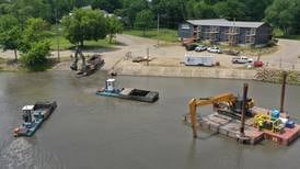 Photos: A look at the dredging operations at Henry Marina