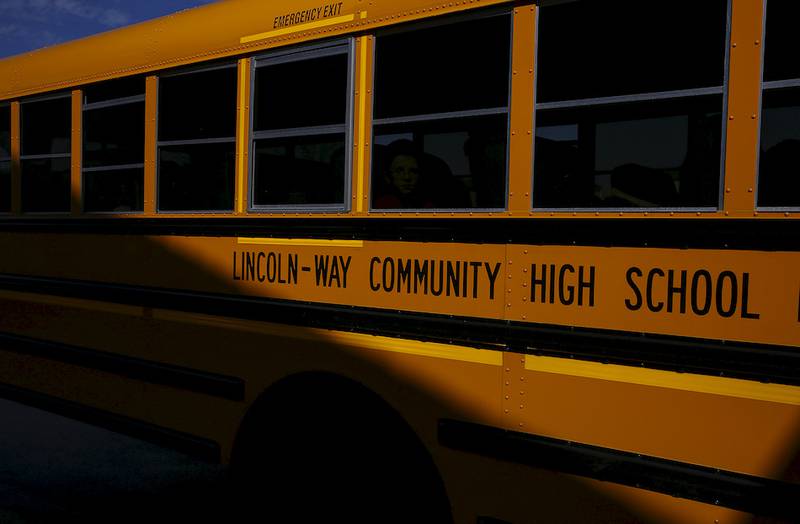 A Lincoln-Way Community High School bus leaves District 114 Elementary after class was dismissed Wednesday in Manhattan.