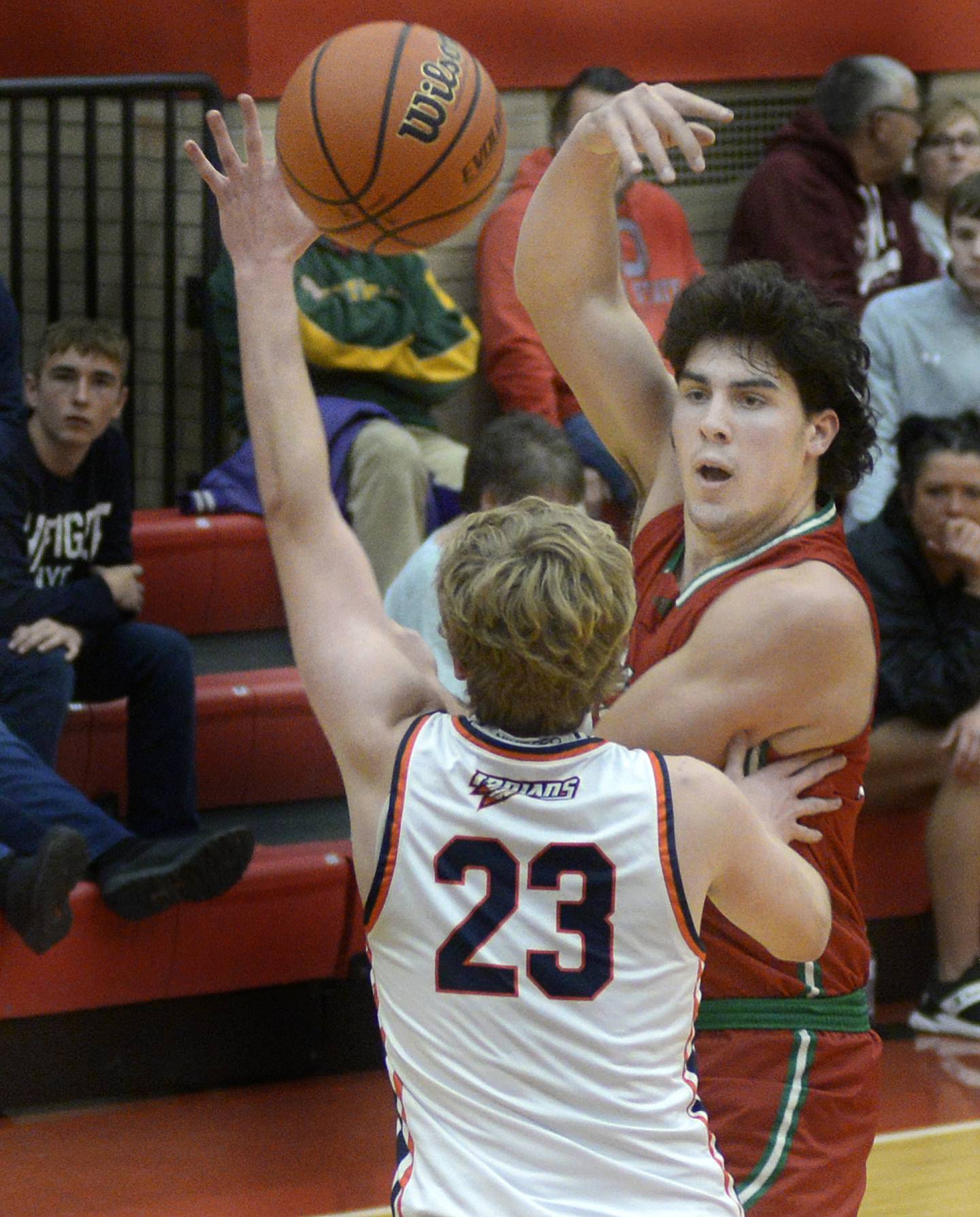 La Salle Peru’s Josh Senica flips a one handed pass over the head of Plano’s Isaiah Martinez in the1st period Saturday during the Dean Riley Shootin’ The Rock Thanksgiving Tournament at Ottawa.