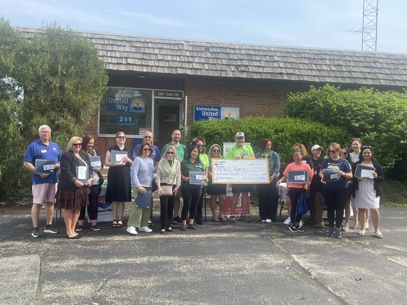 Representatives from area organizations supported by Kishwaukee United Way donations are all smiles Thursday, June 12, 2025, at the kick off of the agency's annual volunteer Day of Caring in DeKalb.
