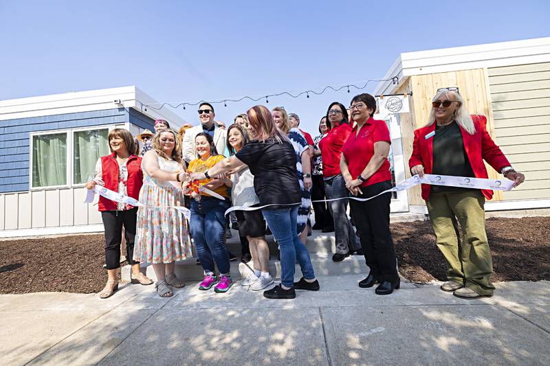 Four new business owner front the ribbon cutting Tuesday, June 6, 2023 to officially open Sterling Main Street’s Shoppes at Grandon.