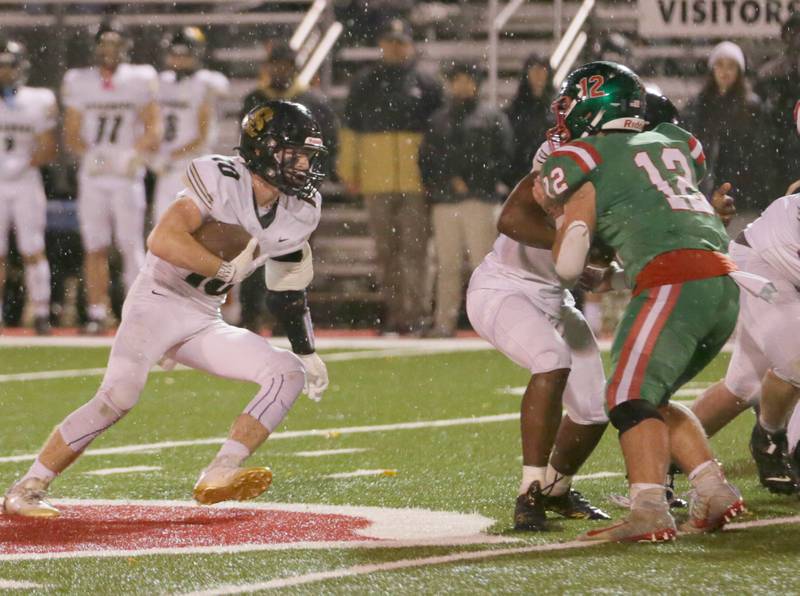 Sycamore's Zach Crawford (10) runs with the ball against L-P on Friday, Oct. 14, 2022 at Howard Fellows Stadium in Peru.