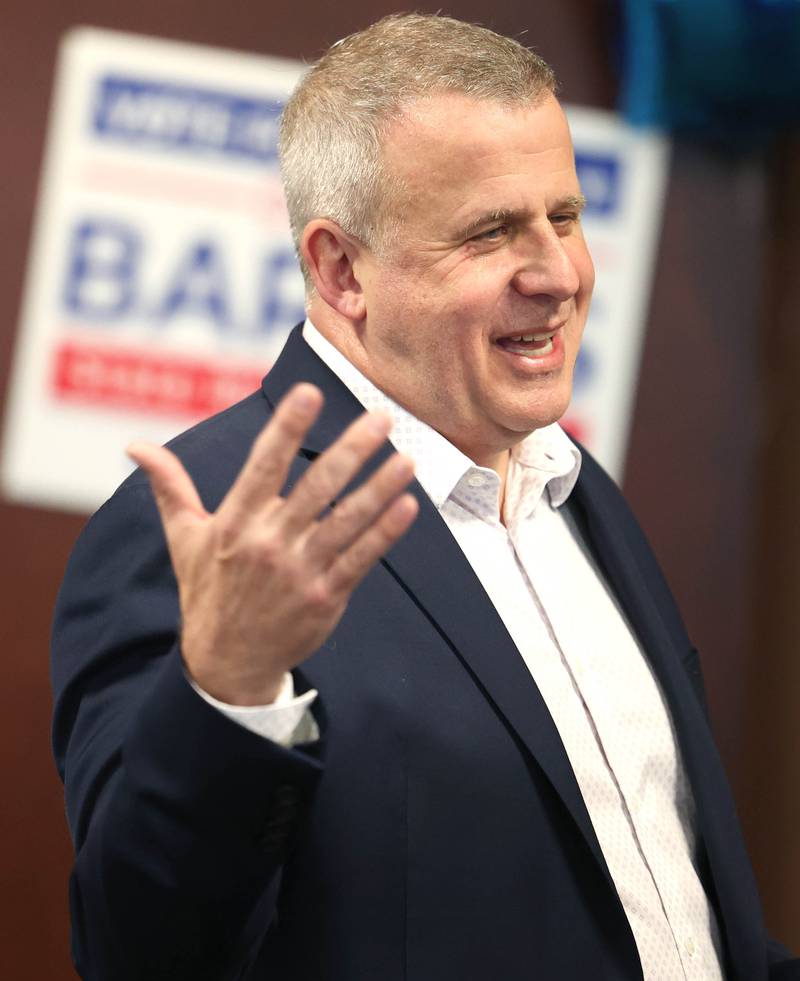 Cohen Barnes, DeKalb mayor and candidate for the democratic nomination for the 76th district seat in the Illinois House of Representatives, talks to supporters Tuesday, March 19, 2024, during his election night party at Faranda’s in DeKalb.