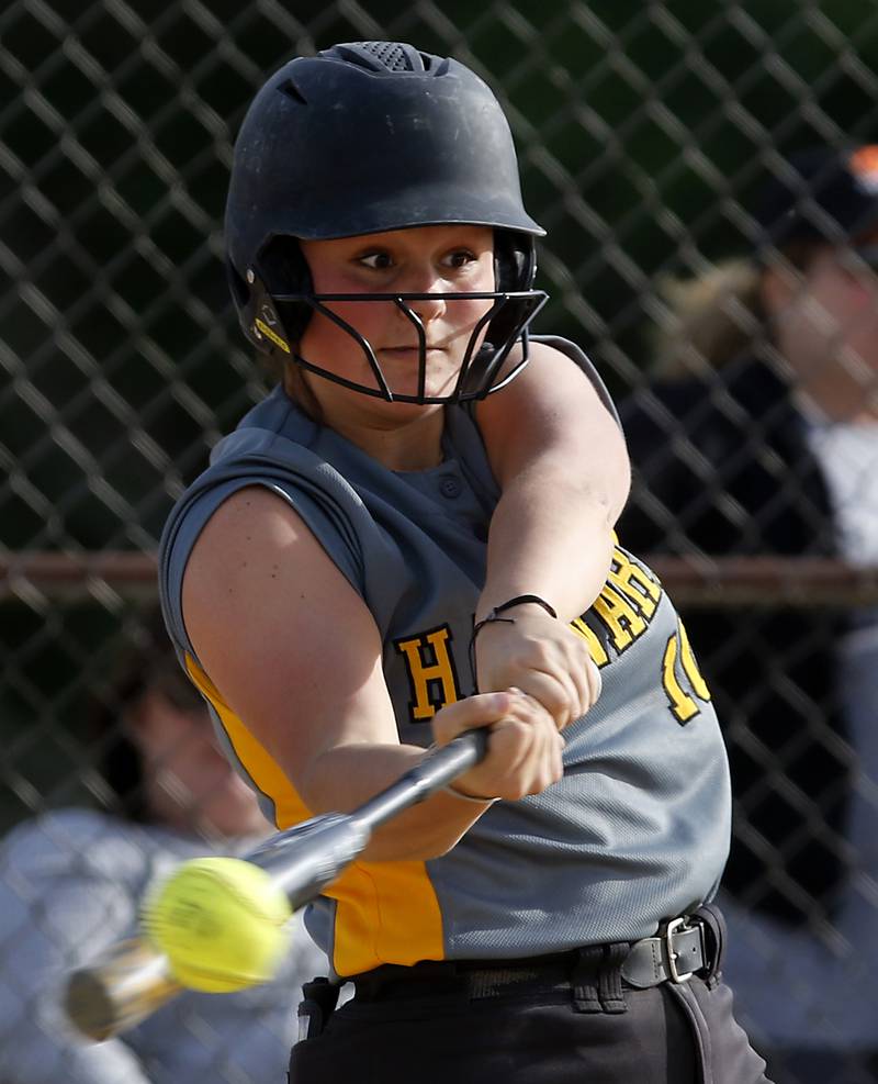 Harvard’s Kristi Knop connects with the ball during a nonconference softball game against Crystal Lake Central Monday, May 15, 2023, at Crystal Lake Central High School.