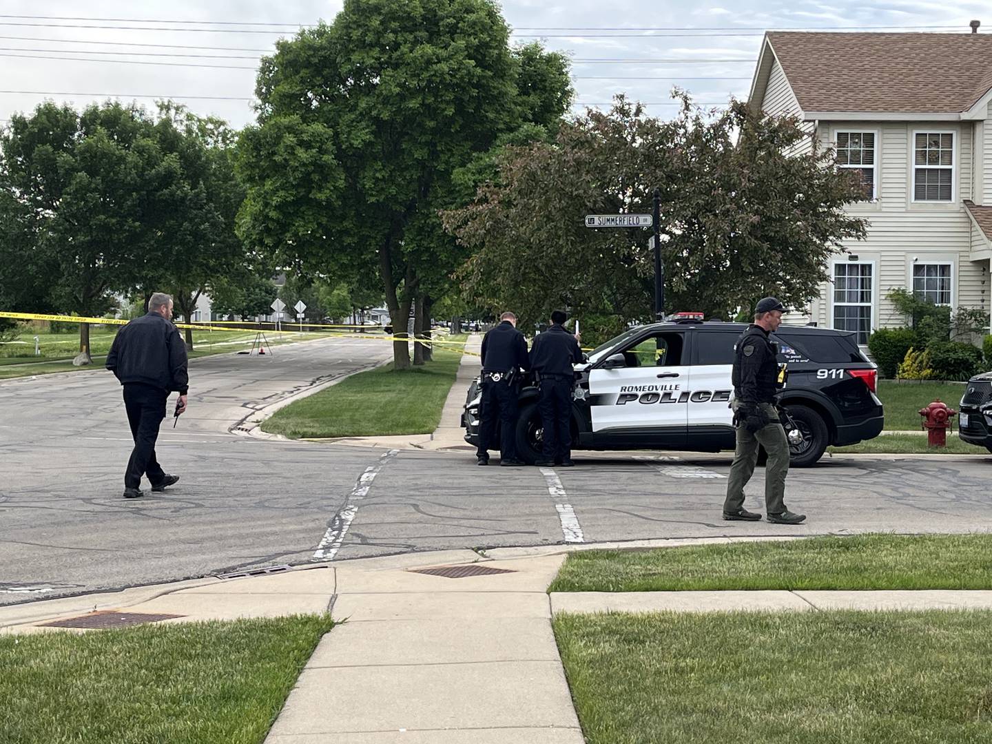 Officers at the intersection of Summerfield Drive and Sierra Trail on Thursday, May 26, 2023. A Romeoville police officer was shot in the shoulder during the apprehension of suspect in a stolen motor vehicle incident.