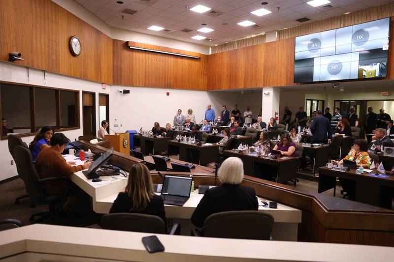 Citizens line up to speak in support of the proposed in-patient rehabilitation facility in Joliet Township at the Will County Board Meeting. Thursday, May 19 2022, in Joliet.