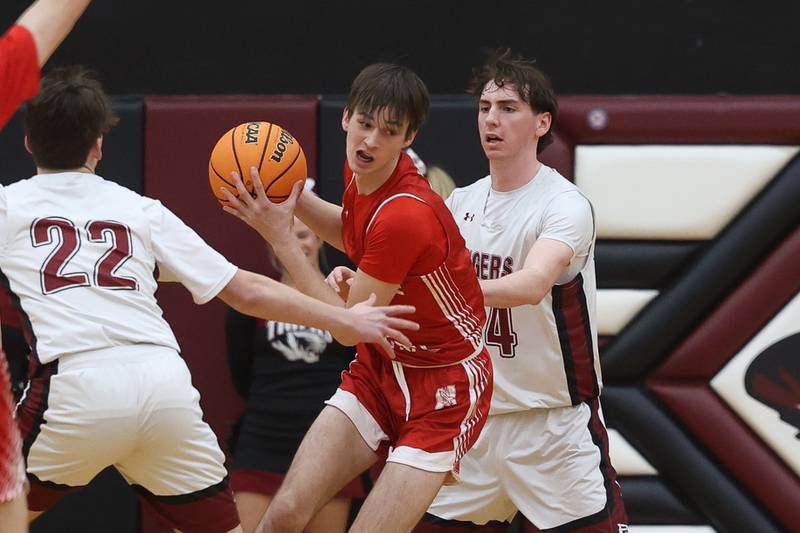 Naperville Central’s Nathan Abrahamson works under the basket against Plainfield North on Wednesday, Jan 22, 2025 in Plainfield.