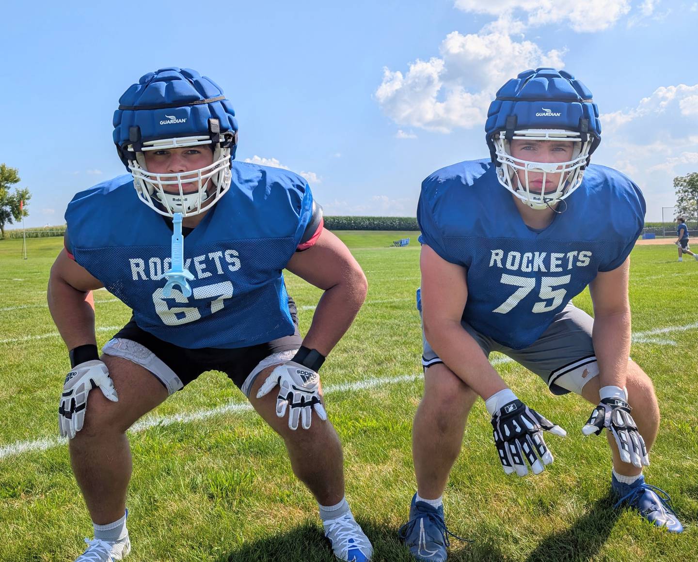 Burlington Central senior offensive linemen Aidan Nuno (left) and Zach Hultgren pose for picture Wednesday, Aug. 13, 2025, at Burlington Central. The two players return to anchor the Rockets' offensive line.