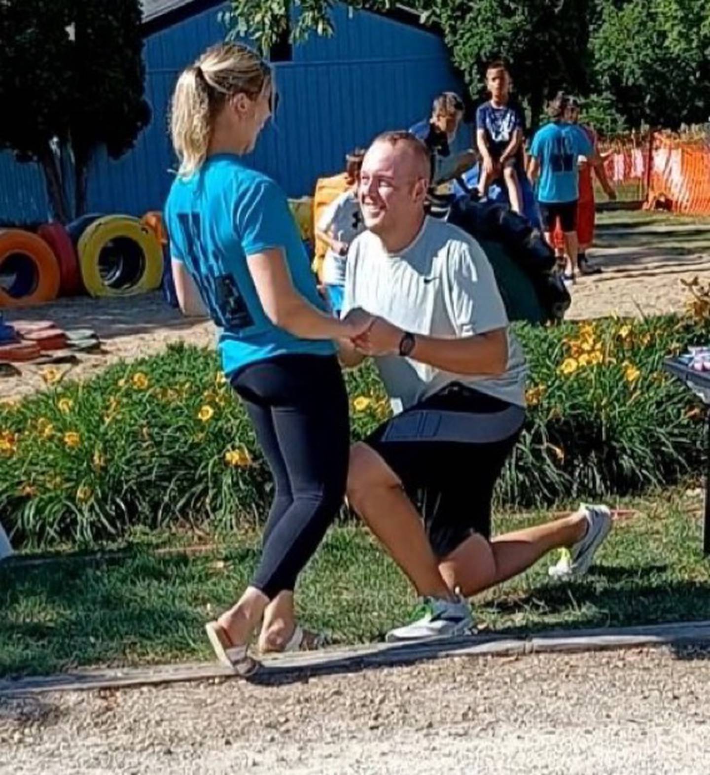 Hillary Monier came to Saturday's Walnut 5K for ALS as race co-director and left with a ring on her finger. Her boyfriend, Rhys Childs, propose to Monier during the event.