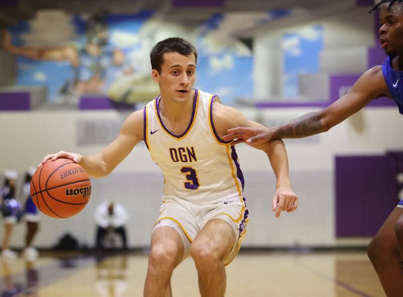 DGN's Ethan Thulin (3) brings up the ball during the boys 4A varsity regional final between Downers Grove North and Proviso East in Downers Groves on Friday, Feb. 24, 2023.