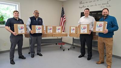 Comcast donates 50 laptops to We Care of Grundy County